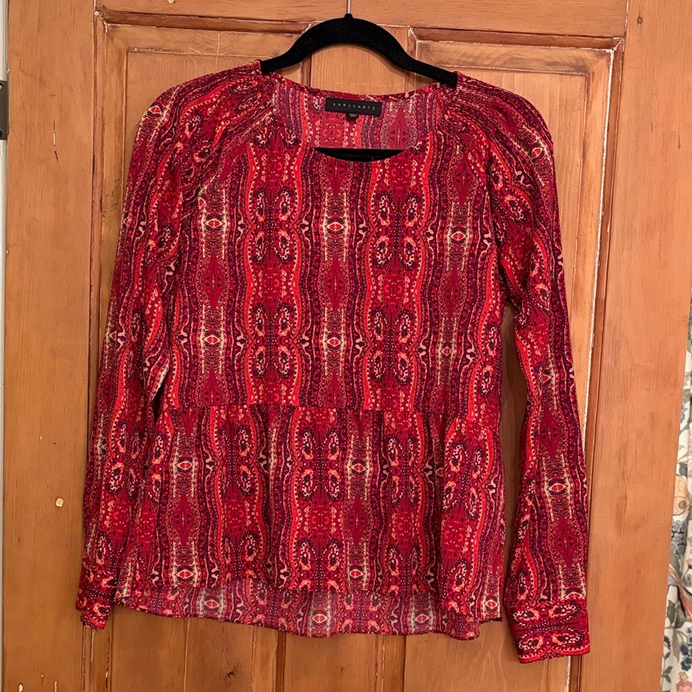 Sanctuary blouse. 
Peplum
